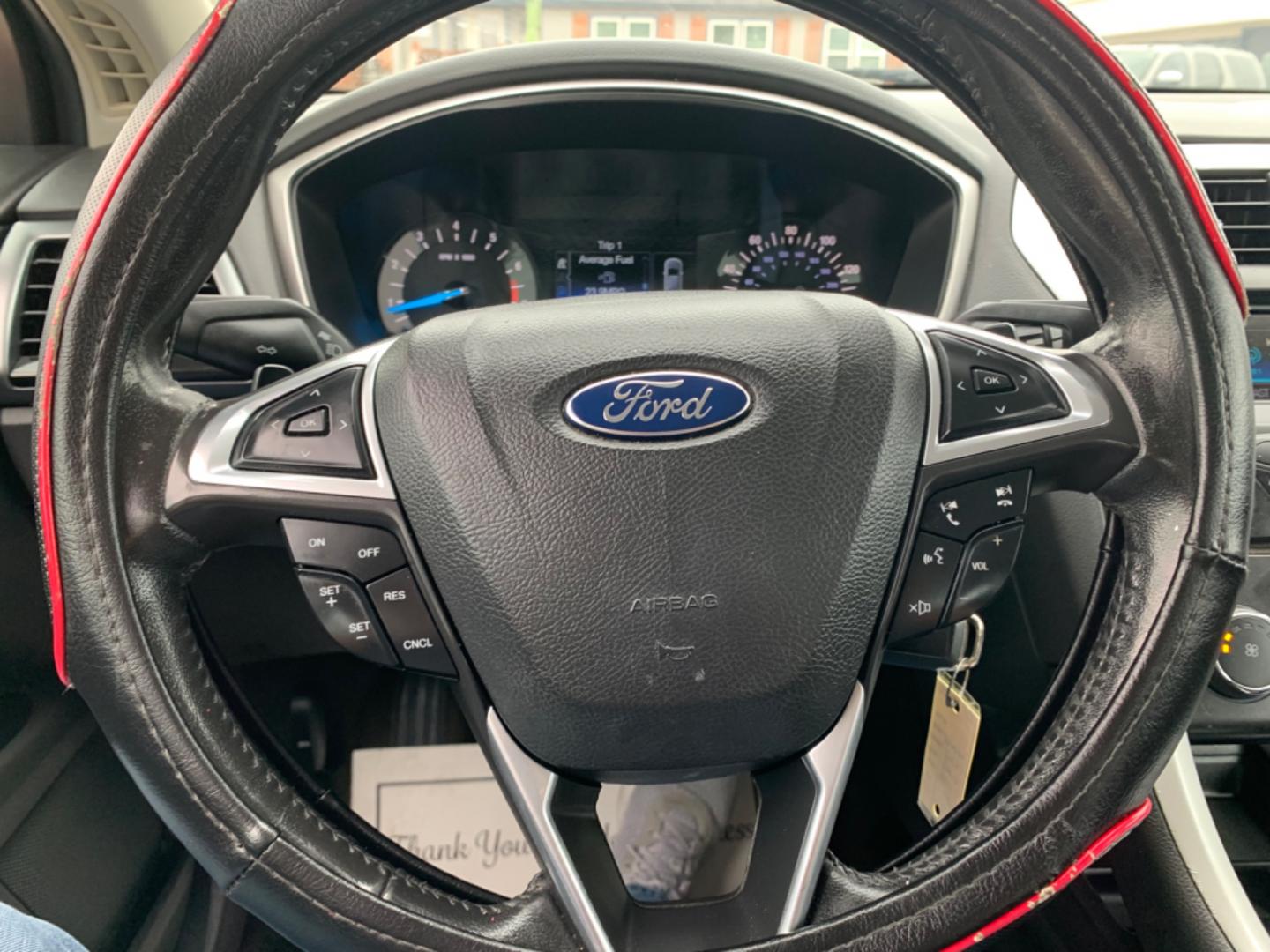 2015 Maroon /Black Ford Fusion SE (3FA6P0H95FR) with an 2.0L L4 DOHC 16V engine, Automatic transmission, located at 1830 North Belt Line Road, Irving, TX, 75061, (469) 524-0199, 32.834373, -96.993584 - Photo#2